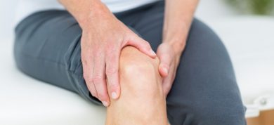 woman suffering from knee pain